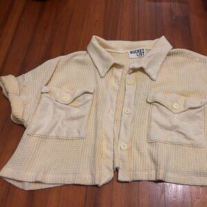 yellow cropped button up top